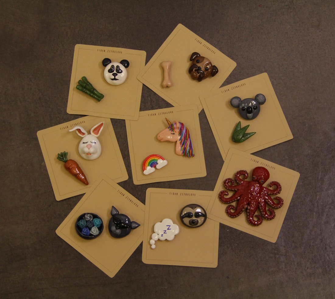 The full set of animal pins, fanned out