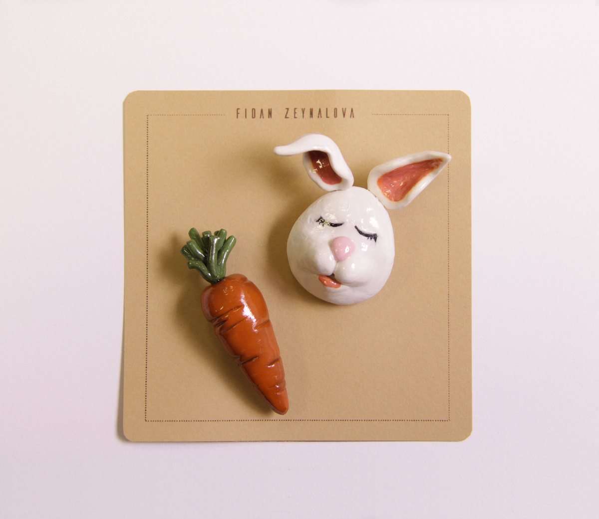 A clay bunny and carrot