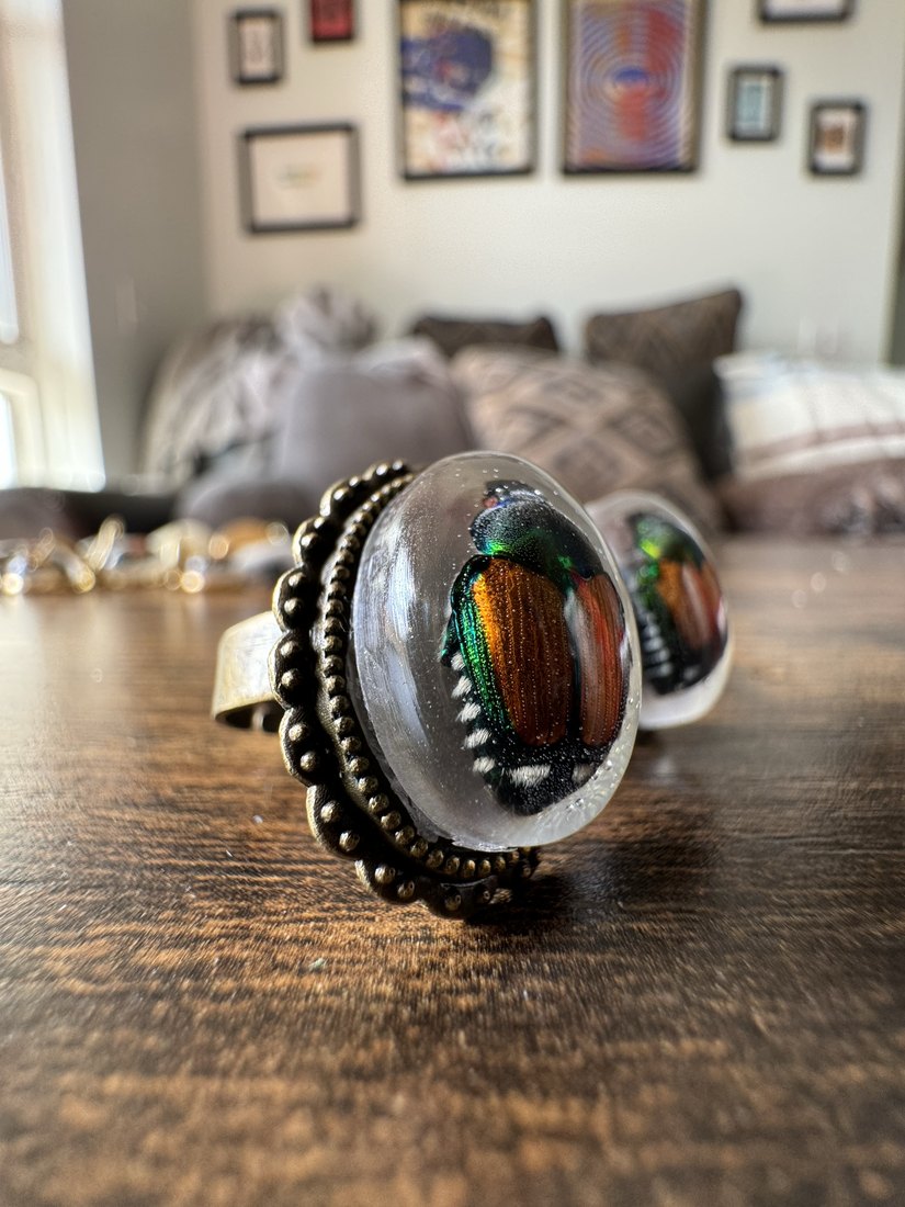 A beetle ring on a stand