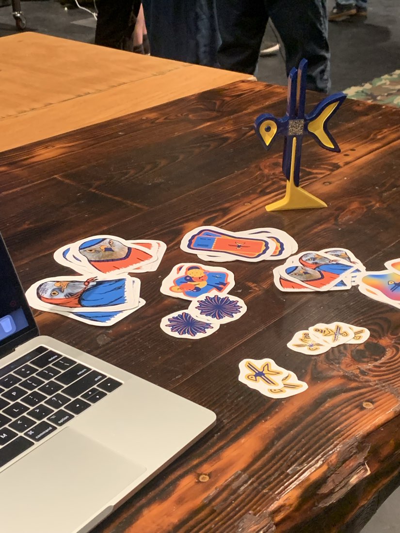 The Capstone exhibit table, with the printed logo and the Kite stickers laid out