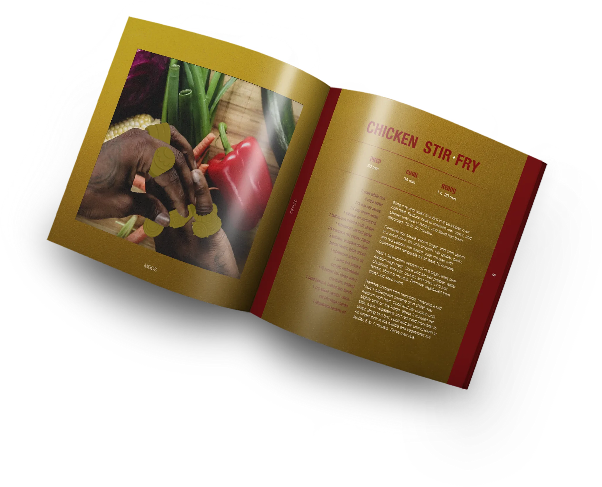 The recipe book open on a spread: a photograph of hands cooking on the left page and CHICKEN STIR FRY with its method set in gold on the right