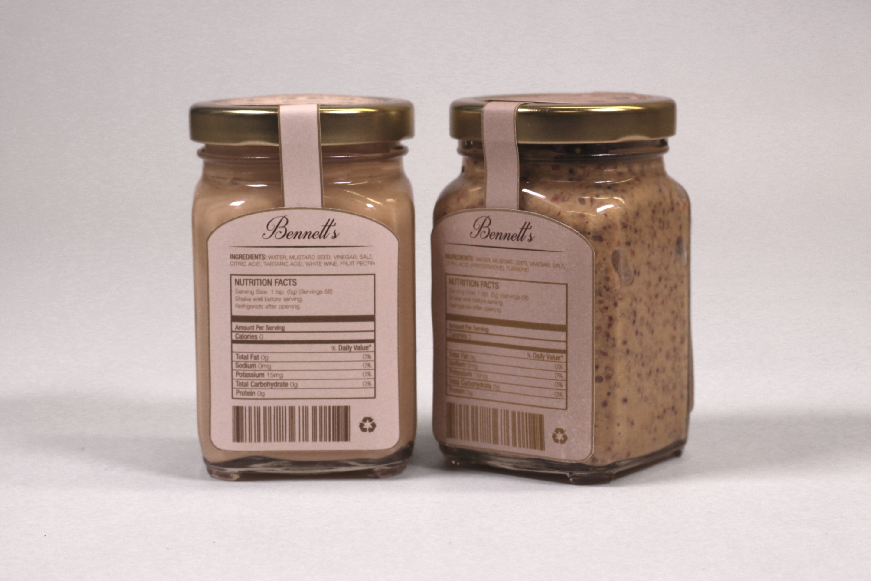 The backs of both jars, with the ingredients and nutrition panels set into the pattern