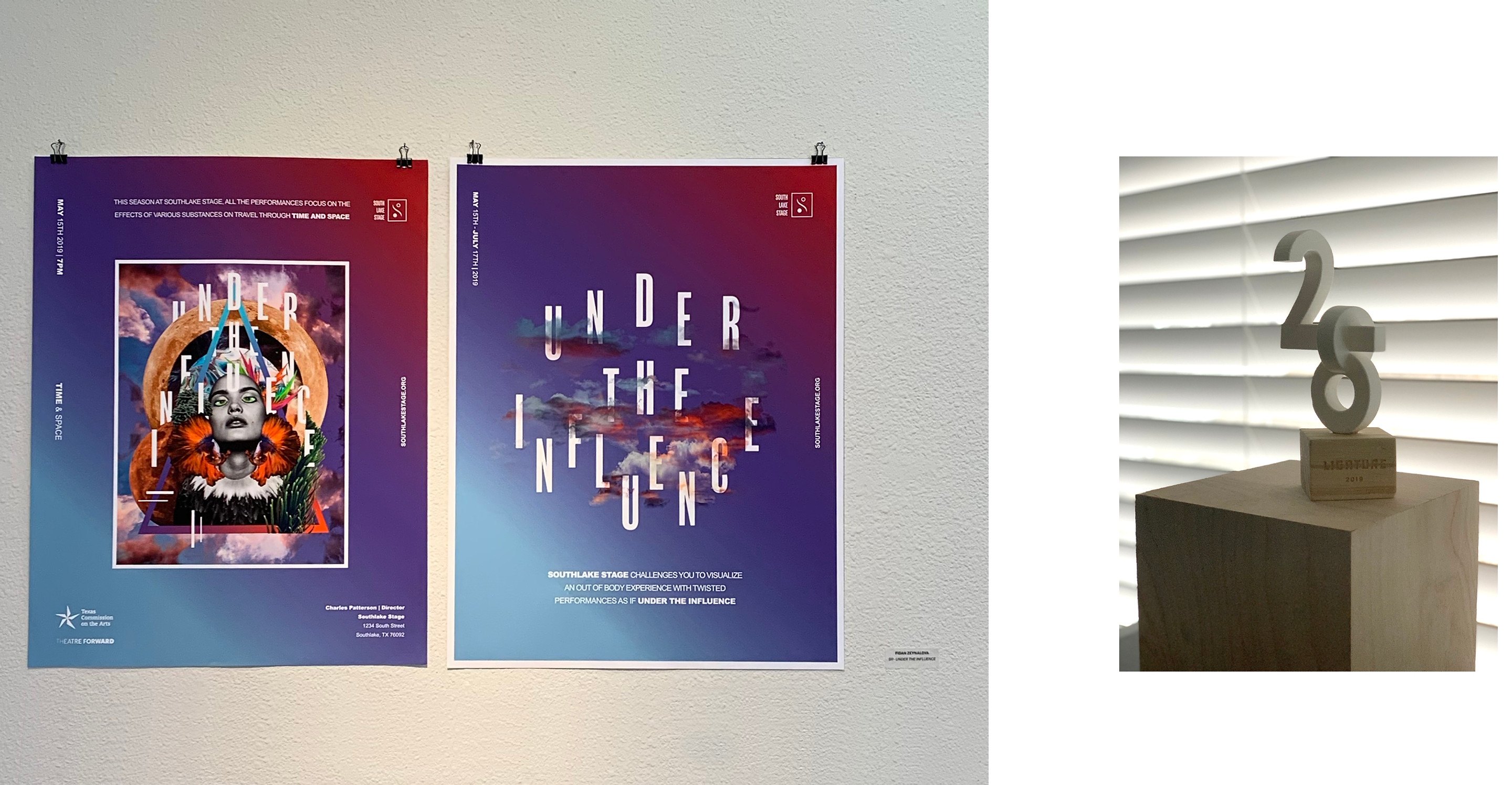 The award: both posters pinned side by side on a gallery wall at the Ligature symposium, and beside them the Best Senior Design trophy standing on a plinth in front of window blinds