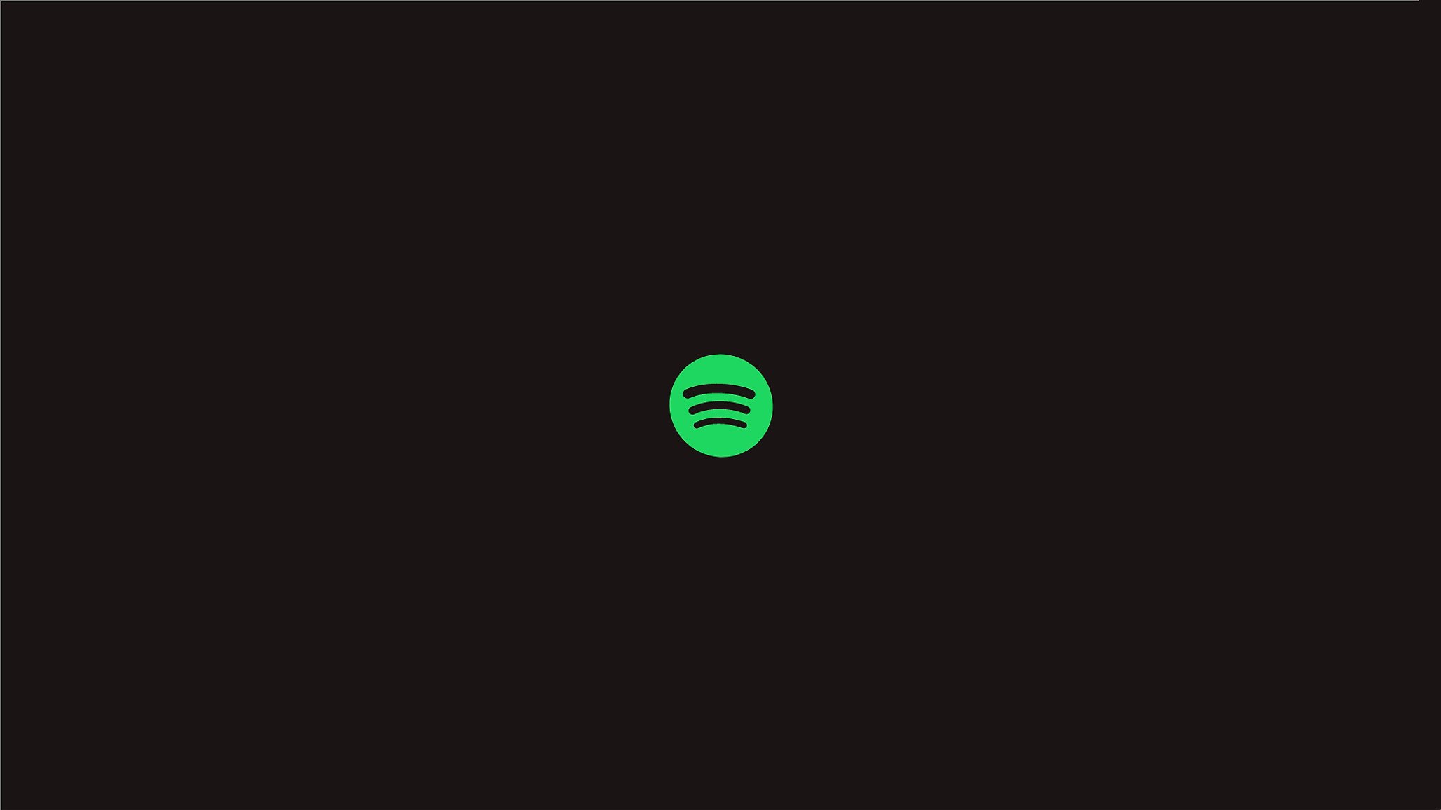 The opening screen: the Spotify mark centred small on near-black